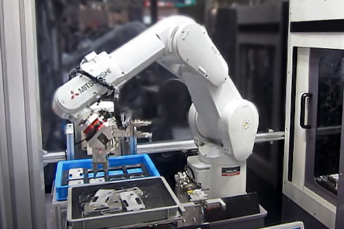 The Use of CNC Machine Tending and Robotic Case Packer Technology